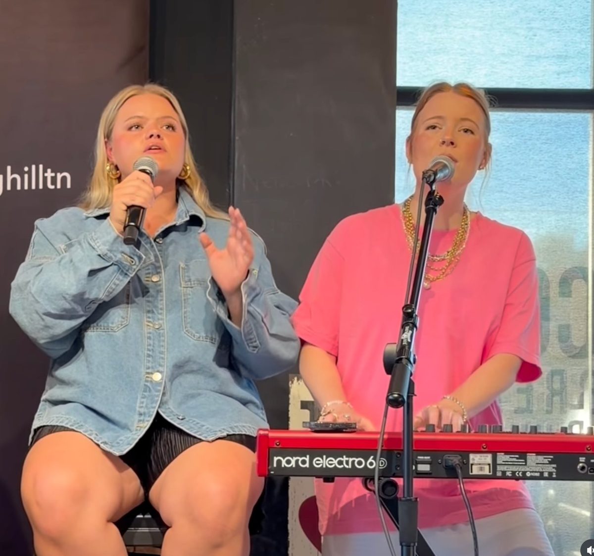 Two singers, one at a keyboard
