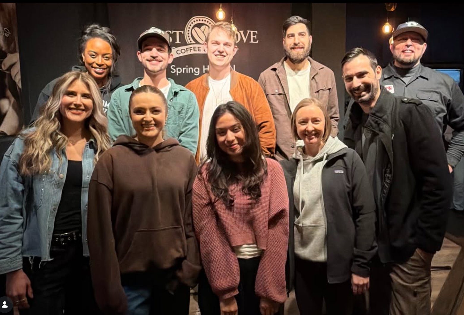 A community gathered after a round at Just Love Coffee Cafe.